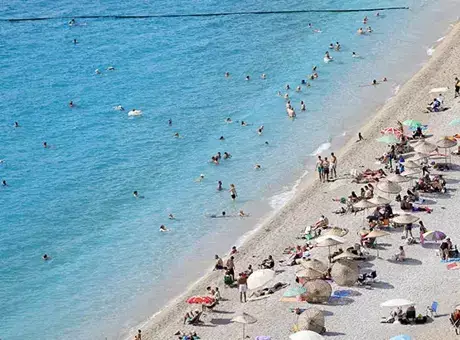 Muğla'da Eylül sıcağı! Sahilde yazı aratmayan görüntüler